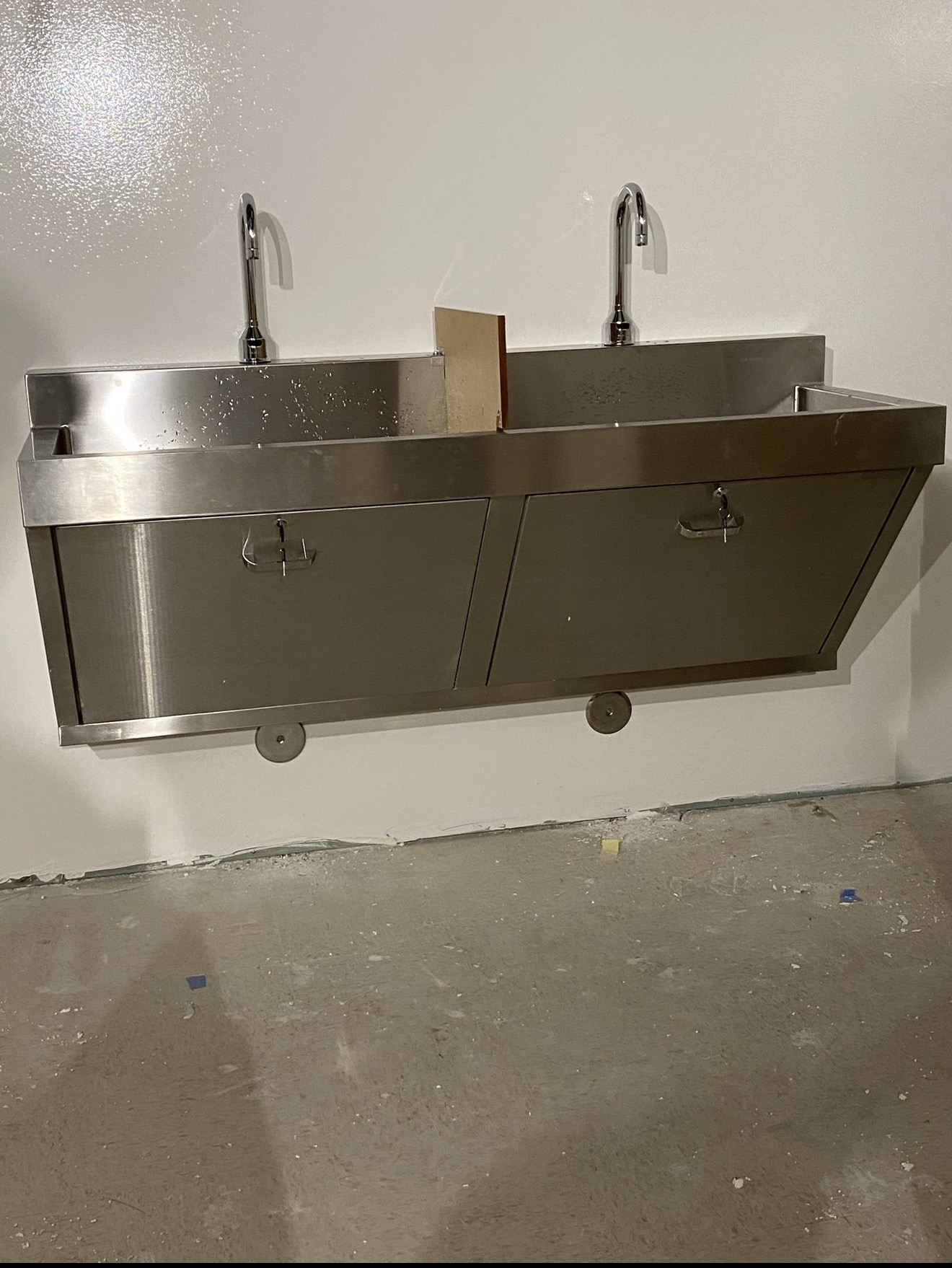 Finished double commercial lab sink installation